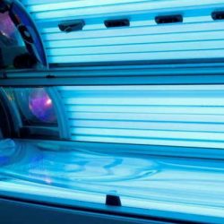 What should I know before going to a tanning salon?