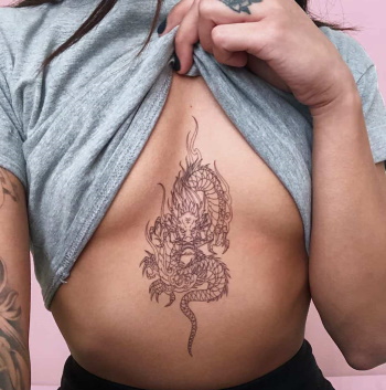 tattoo between chest